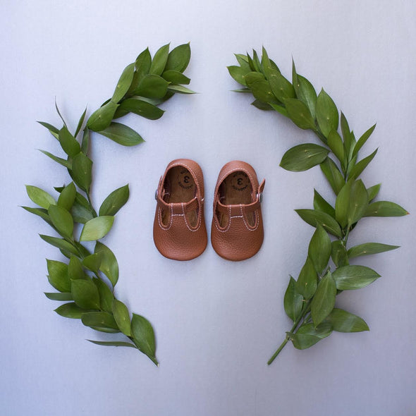 the original soft soled t-strap: cognac