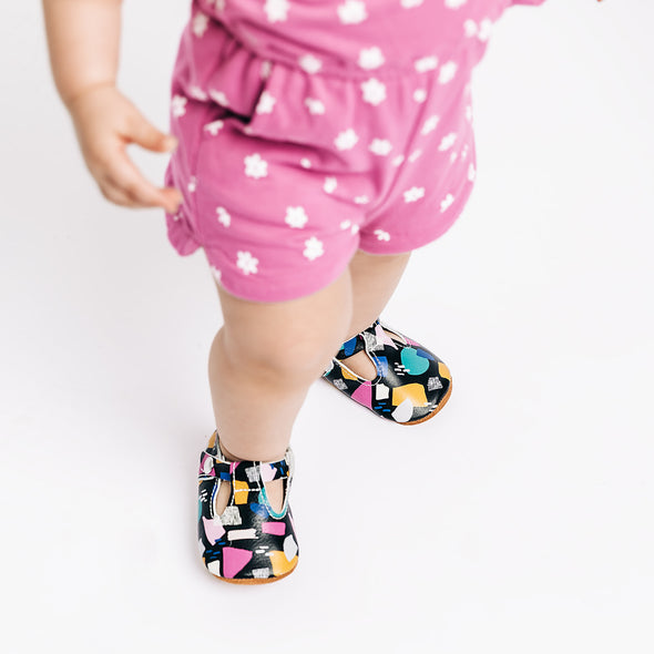 the original soft soled t-strap: paper collage an ampersand collection