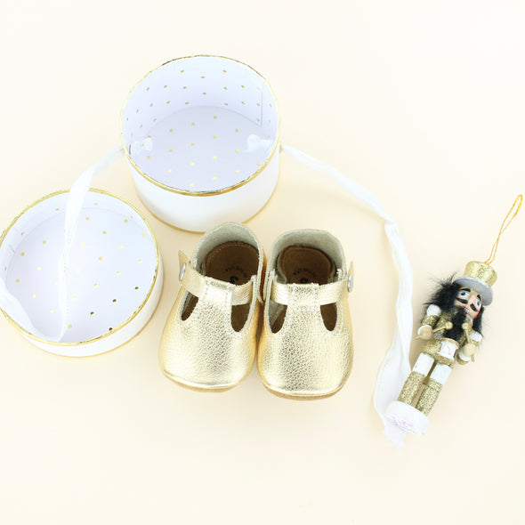 the original soft soled t-strap: gold