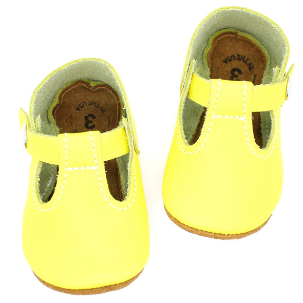 the original soft soled t-strap: neon yellow