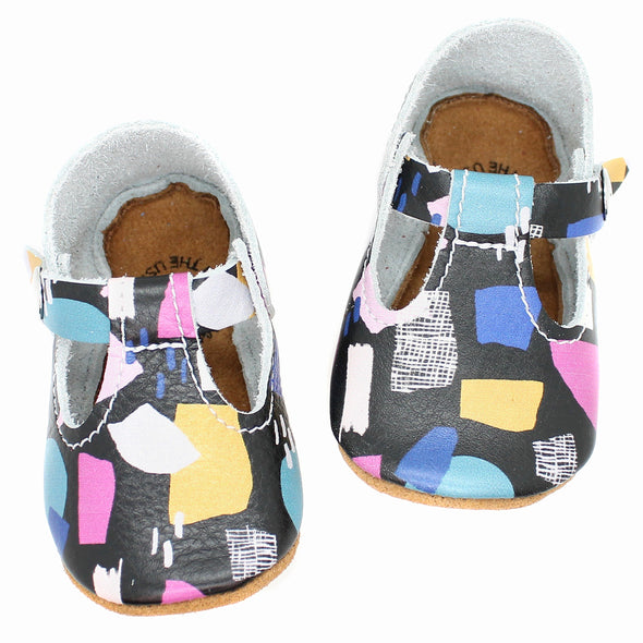 the original soft soled t-strap: paper collage an ampersand collection