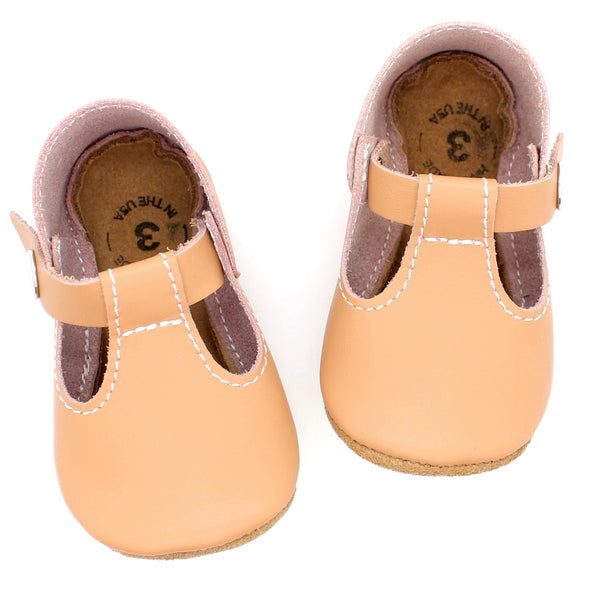 the original soft soled t-strap: sandstone