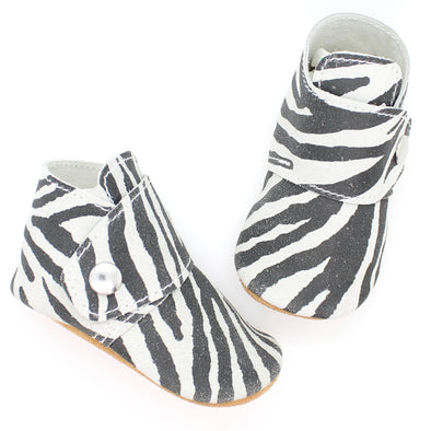 the snap boot: distressed zebra suede